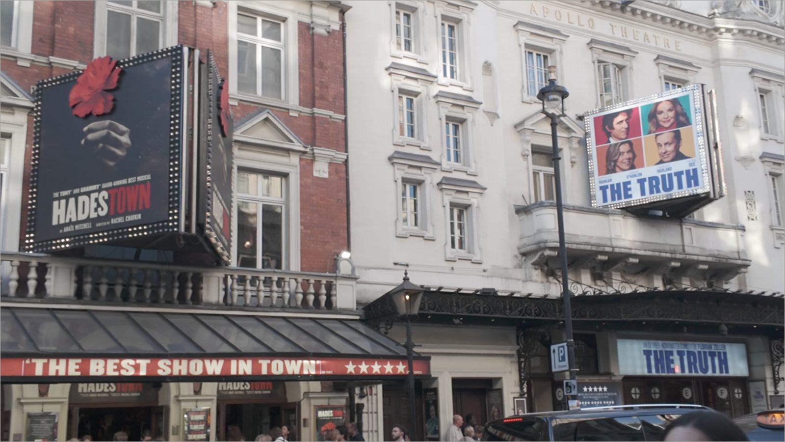 Theatre fronts on a West End street in London