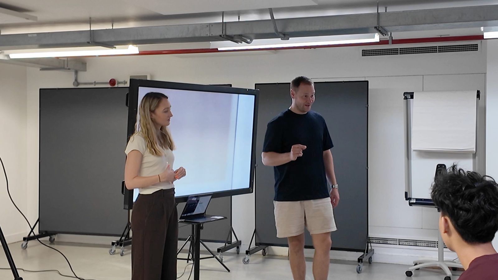 Practitioners leading a spoken performance session